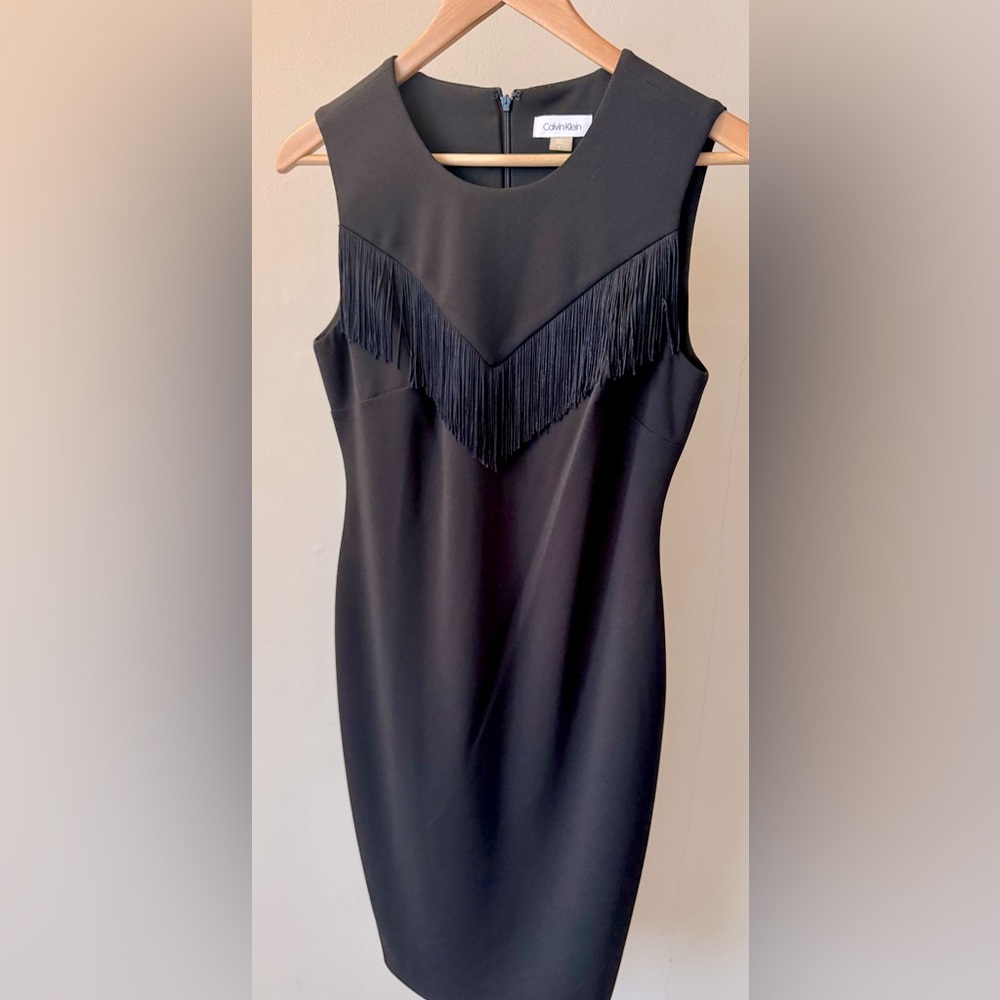 Chic Black Midi Dress with Fringe Detail
Brand new with tags